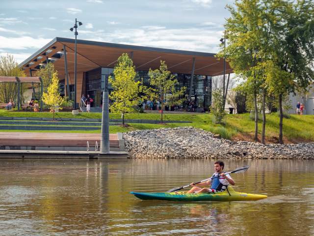 A kayaker paddles along the St Marys River at Promenade Park