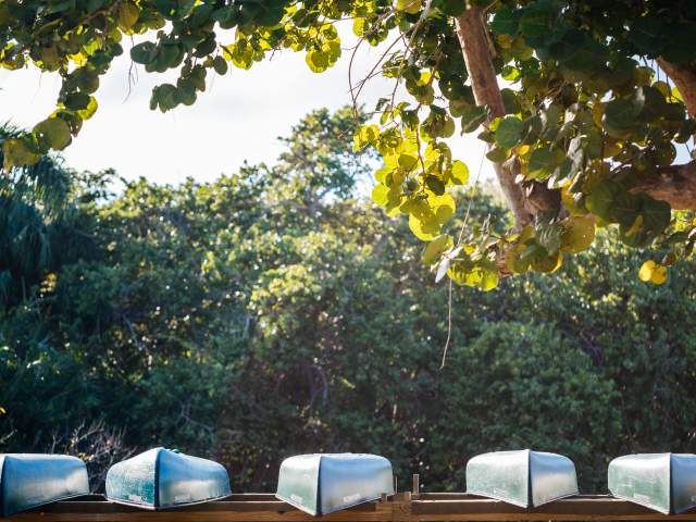 Canoes rest upside down on a dock at one of North Lauderdale's many waterways