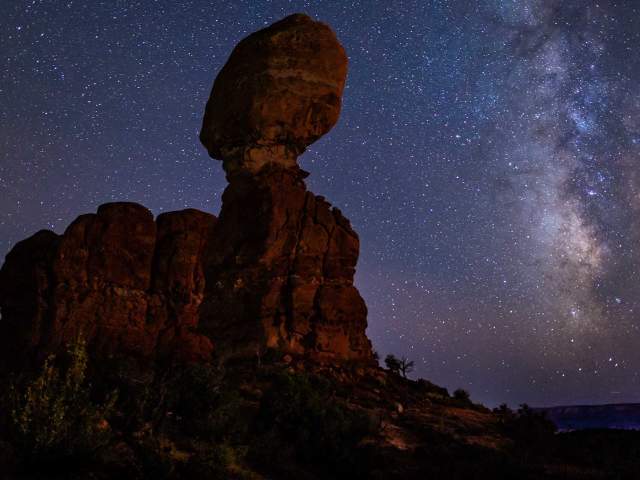 Balanced rock under stars