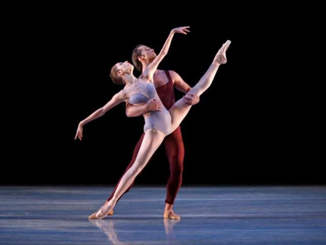 Two ballerinas dance across the stage at the Rozsa Center for the Performing Arts