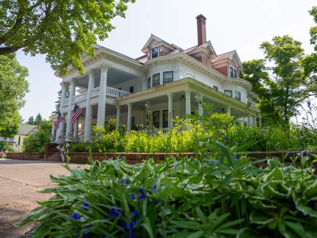 exterior side view of the laurium manor inn