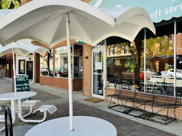 Patio seats in front of Landline Doughnuts