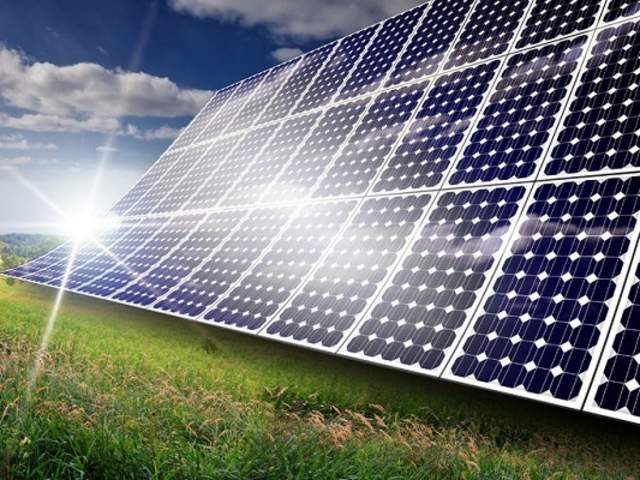 A cleantech solar panel in a field.