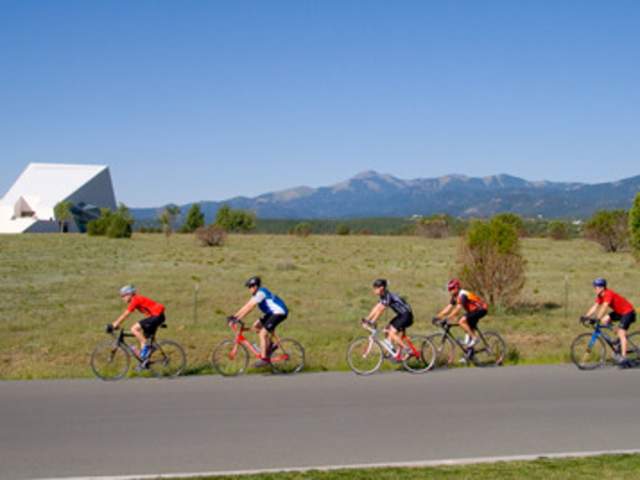 A group of road bikers ride through New Mexico