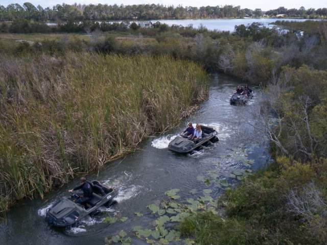 Revolution The Off Road Experience group riding atv