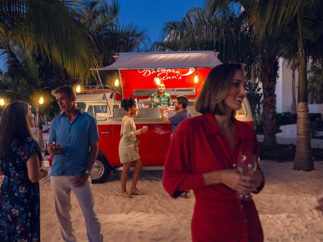 People at beach bar at Evermore Orlando Resort