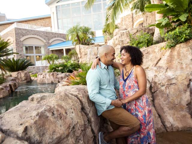 Loews Sapphire Falls Resort at Universal Orlando™ couple by lagoon