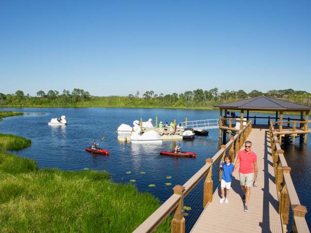 Family fishing at Lake Austin pier at The Grove Resort Orlando
