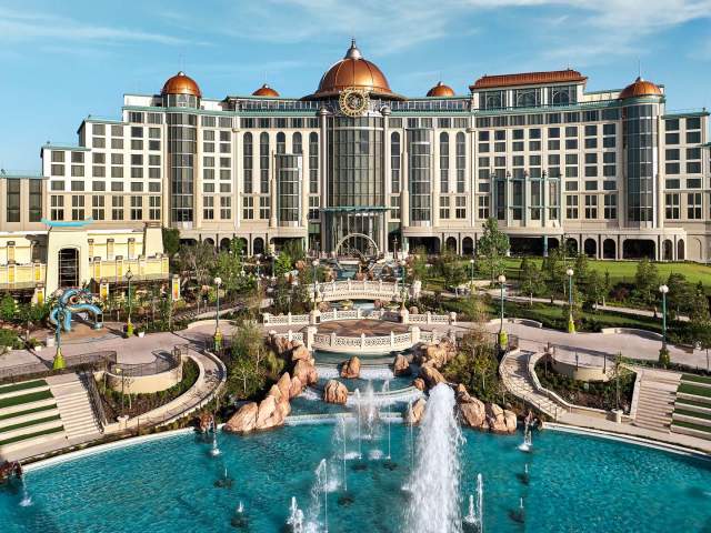 The park-facing exterior of Universal Helios Grand Hotel, a Loews Hotel, seen from inside Universal Epic Universe in Orlando