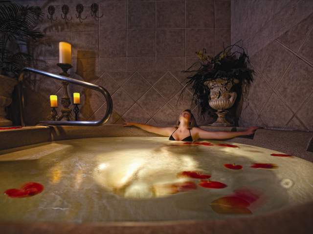 Serenity Spa by Westgate at Westgate Lakes Resort & Spa woman in hot tub