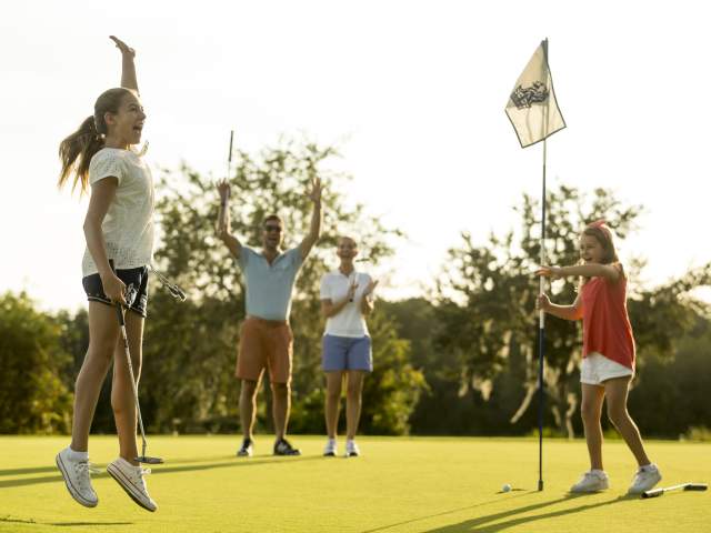 JW Marriott Orlando, Grande Lakes family playing golf