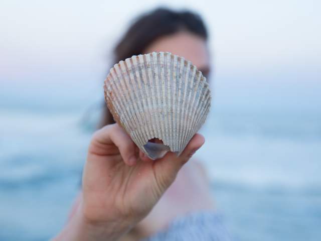 Girl Holding Shell