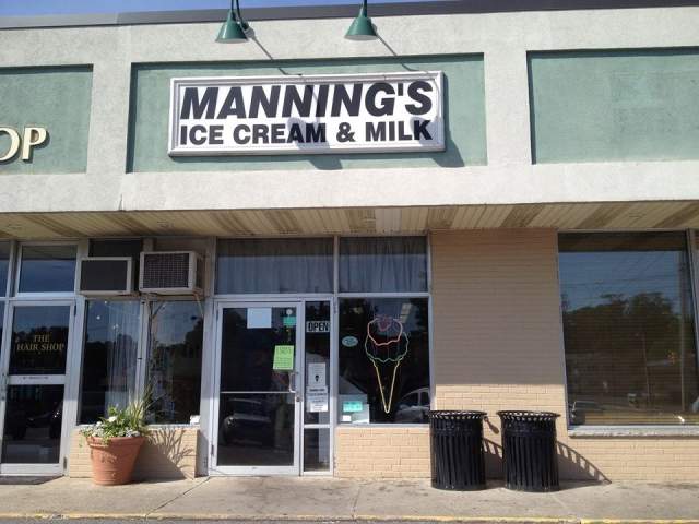 Exterior of a storefront with signage that reads Manning's Ice Cream & Milk
