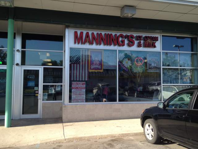 Exterior of a storefront with signage that reads Manning's Ice Cream & Milk