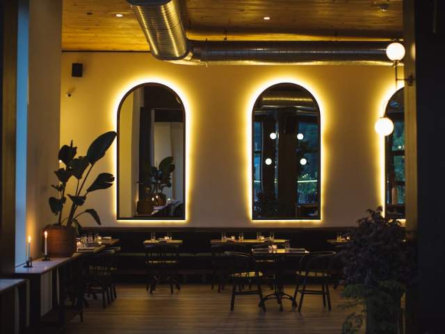 beautiful dining space at a restaurant with candle lights