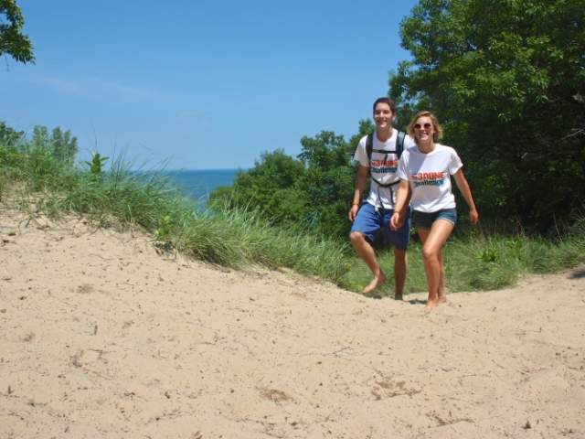 Couple walking on a trail in the dunes