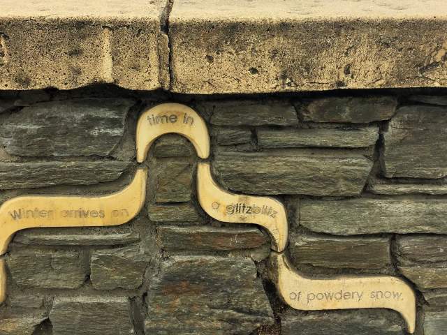 Poem carving along Queenstowns Marine Parade