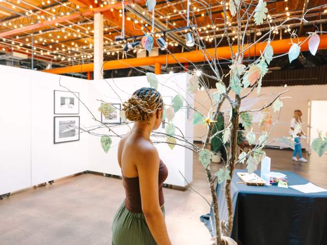 Woman walking through ArtWorks
