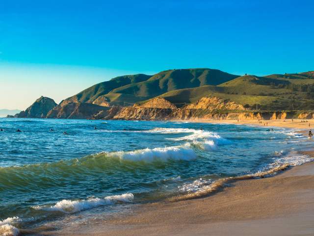 Waves hitting the sand on Montara State Beach in San Mateo County