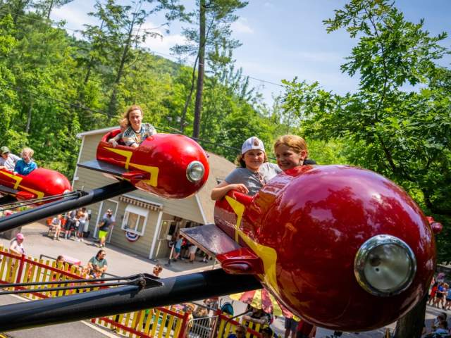 Picture of kids riding and Amusement Park ride at Knoebels