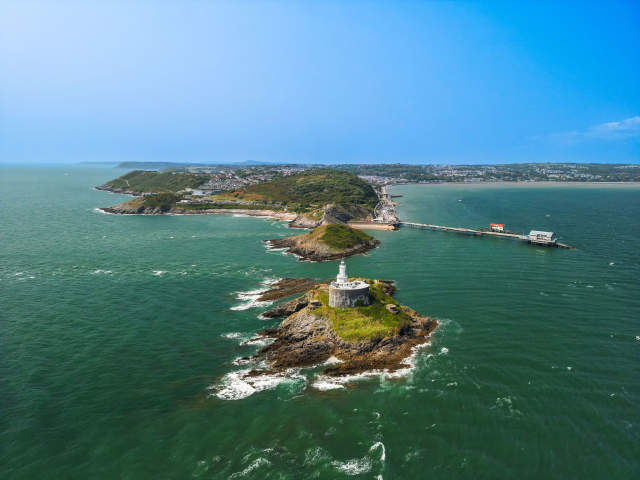 Mumbles drone low altitude Lighthouse towards Mumbles