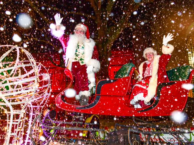 Santa and Mrs Claus on their sleigh at Swansea Christmas Parade