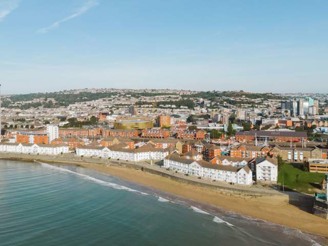 Arial view of Swansea city from the sea