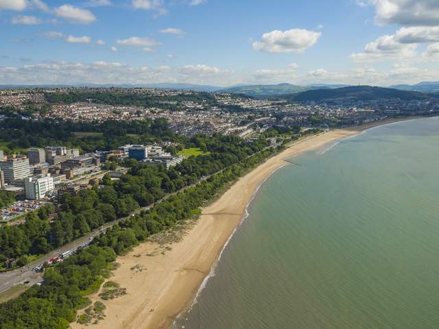 Photo of Swansea University Singleton Campus from the air with the bay