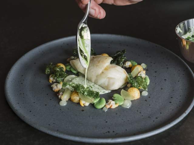 A plate of food prepared by the Beach House