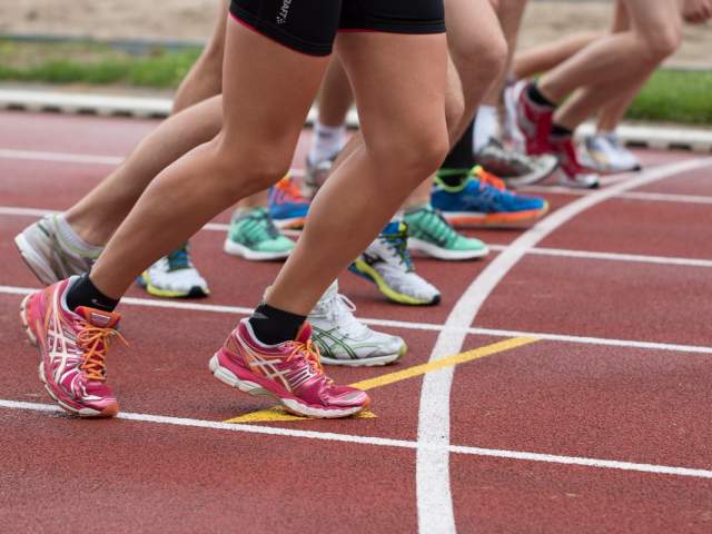Runners feet on track, ready to start