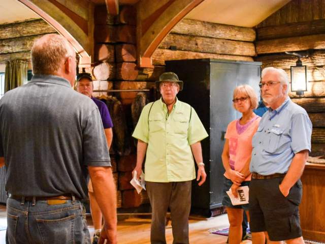 Guests listening intently to the history of Ginseng at Fromm Farm.