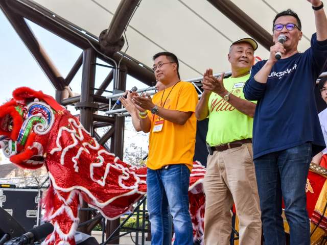 Will and Paul Hsu from Hsu's Ginseng Enterprise introducing the Chinese Lion Dance Group.