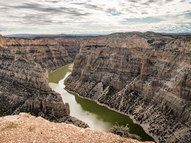 Dramatic cliffs and water below at Bighorn Canyon National Recreation Area in Big Horn County, Wyoming.