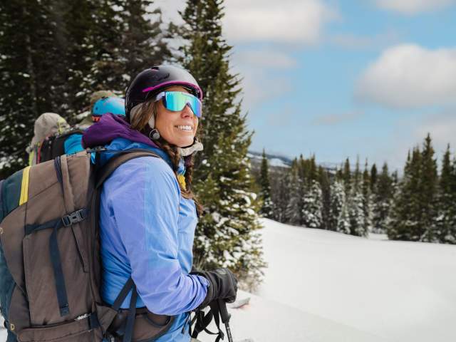 Woman dressed for a winter adventure.