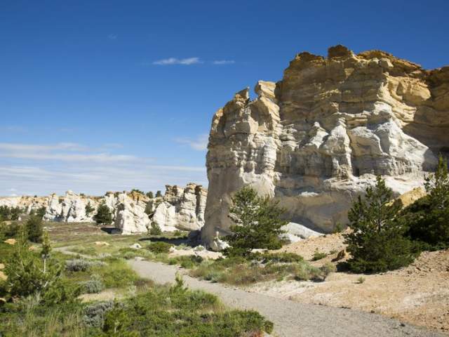 Stone towers on a clear day at Castle Gardens, a Wyoming landmark.