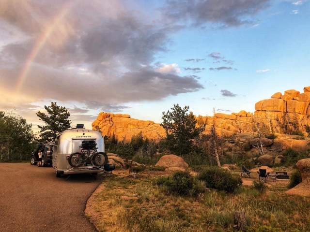 RV camping at sunset in an Airstream at Vedauwoo, Medicine Bow National Forest