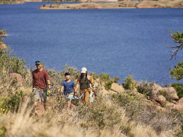 Family enjoying a hike at Curt Gowdy State Park.