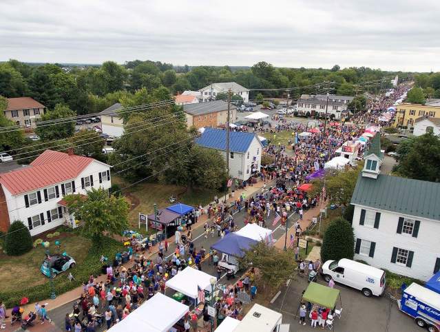 crowds of people in the streets celebrating Haymarket Day