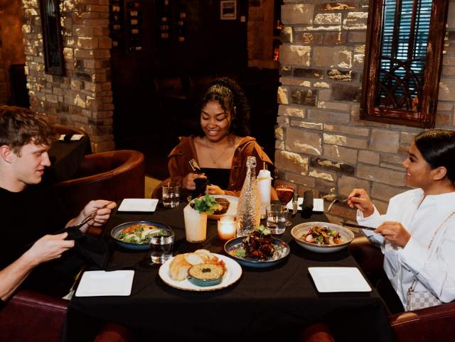 Friends dining at Copper Spoon