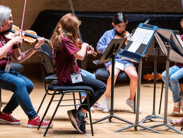children playing violin