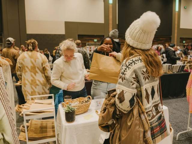 Photo of shoppers at holiday market