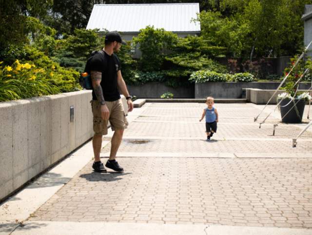 Families enjoying their Father's Day in the Garden at Foellinger-Freimann Botanical Conservatory.