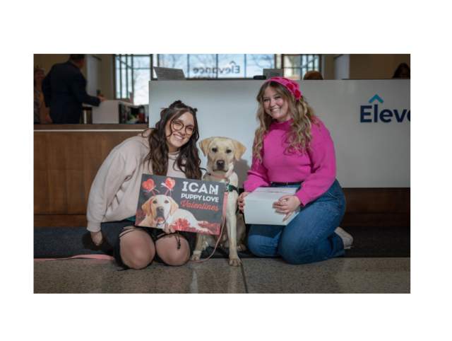 ICAN service dog in training showing love to people