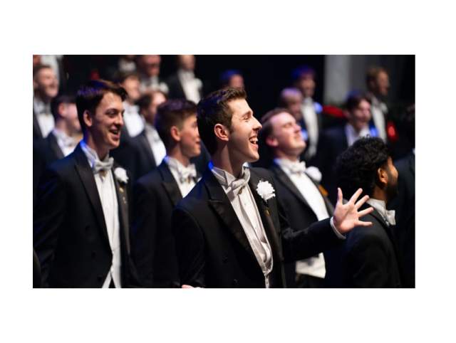 The Purdue Varsity Glee Club performing live on stage