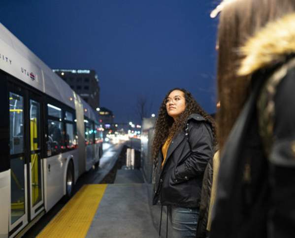 Girls Waiting at UVX Bus Stop