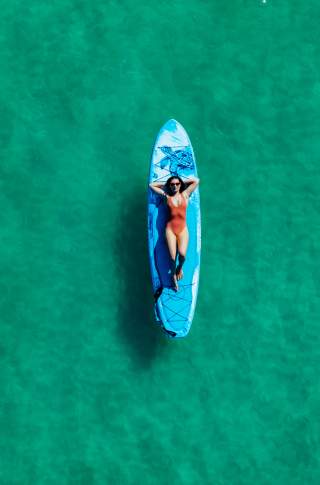 Santa Rosa Beach - Gulf - Woman Lying on SUP