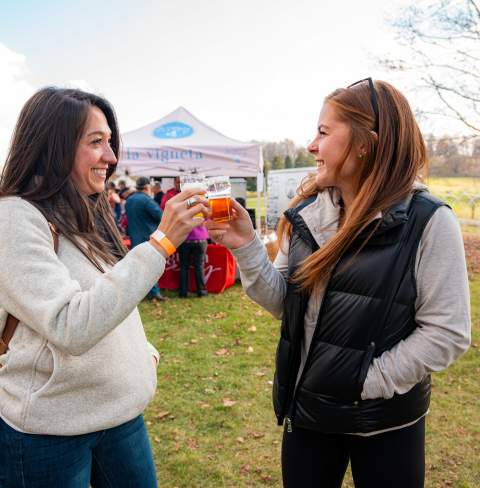 People raise a glass to Bonfires, Barrels & Brews