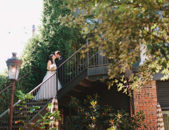 Couple Kissing on Stairway