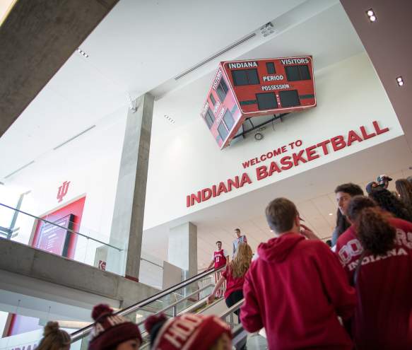 People riding the escalator to the second floor of Assembly Hall