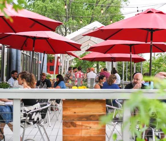 People dining on Cardinal Spirits' patio